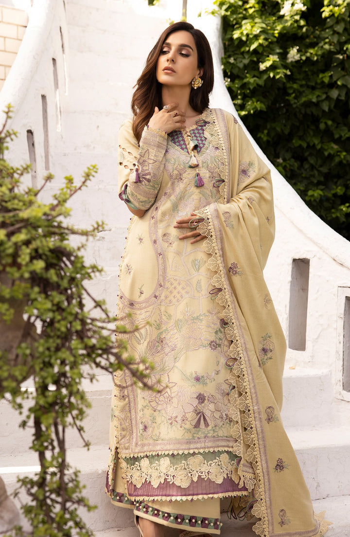 Model styled in Auro Attire by TESSA and Sleeve detailing and warm tones 