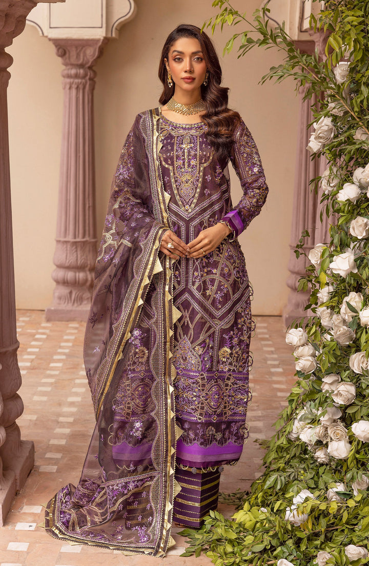 Model wearing Malika Jaan by TESSA in festive lighting