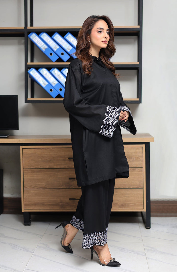 Side pose of model in Nightfall ensemble