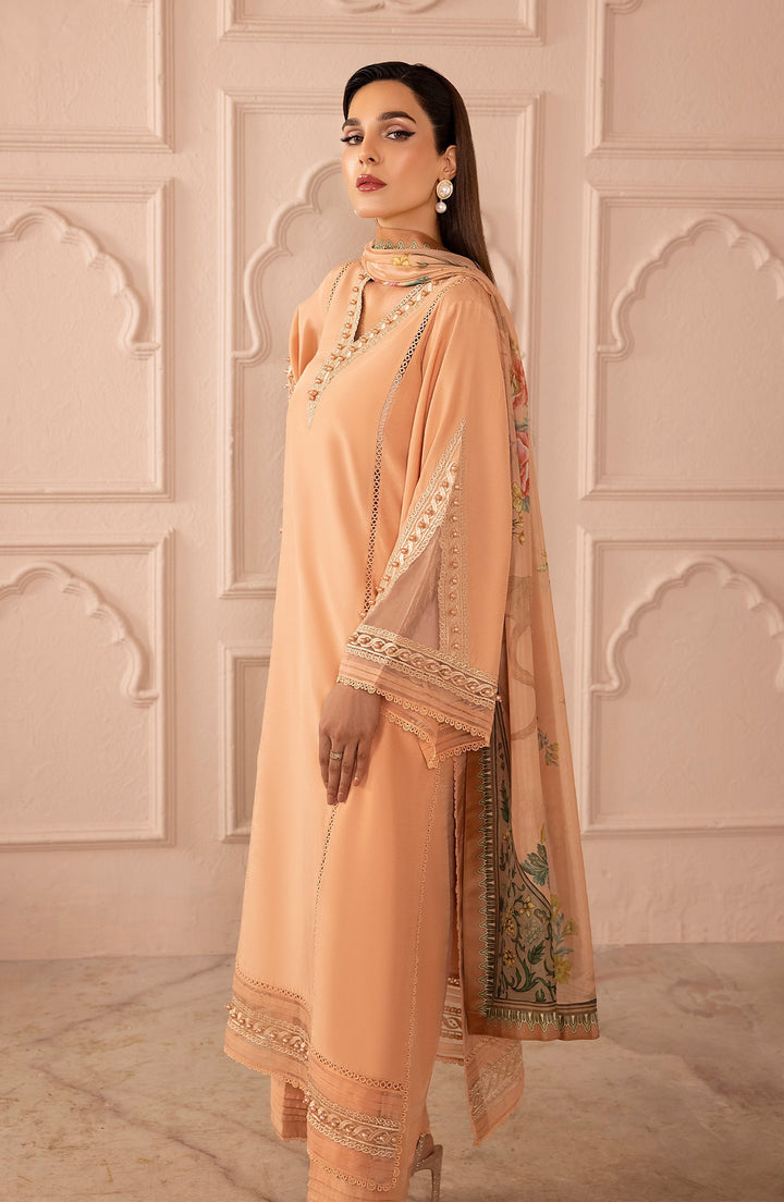 Side profile of model in Peach Delight outfit