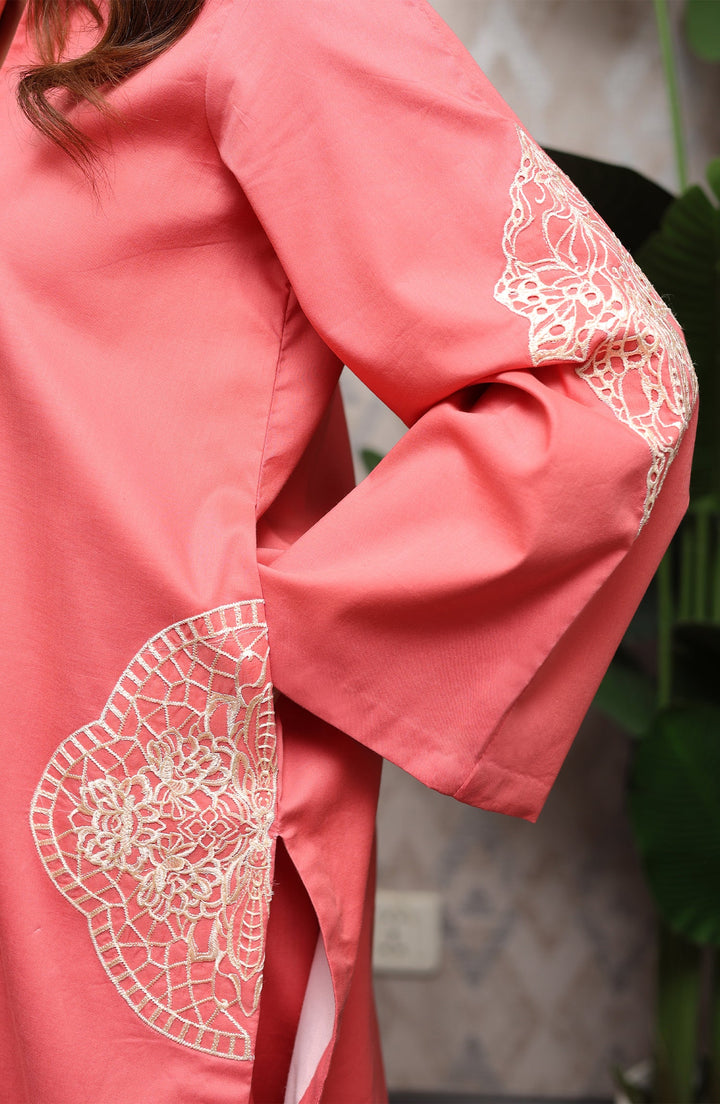 Sleeve and front extension detail on Pink Pop with minimal embroidery
