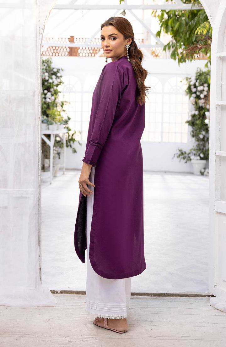 Side pose of model in Violet Whisper ensemble